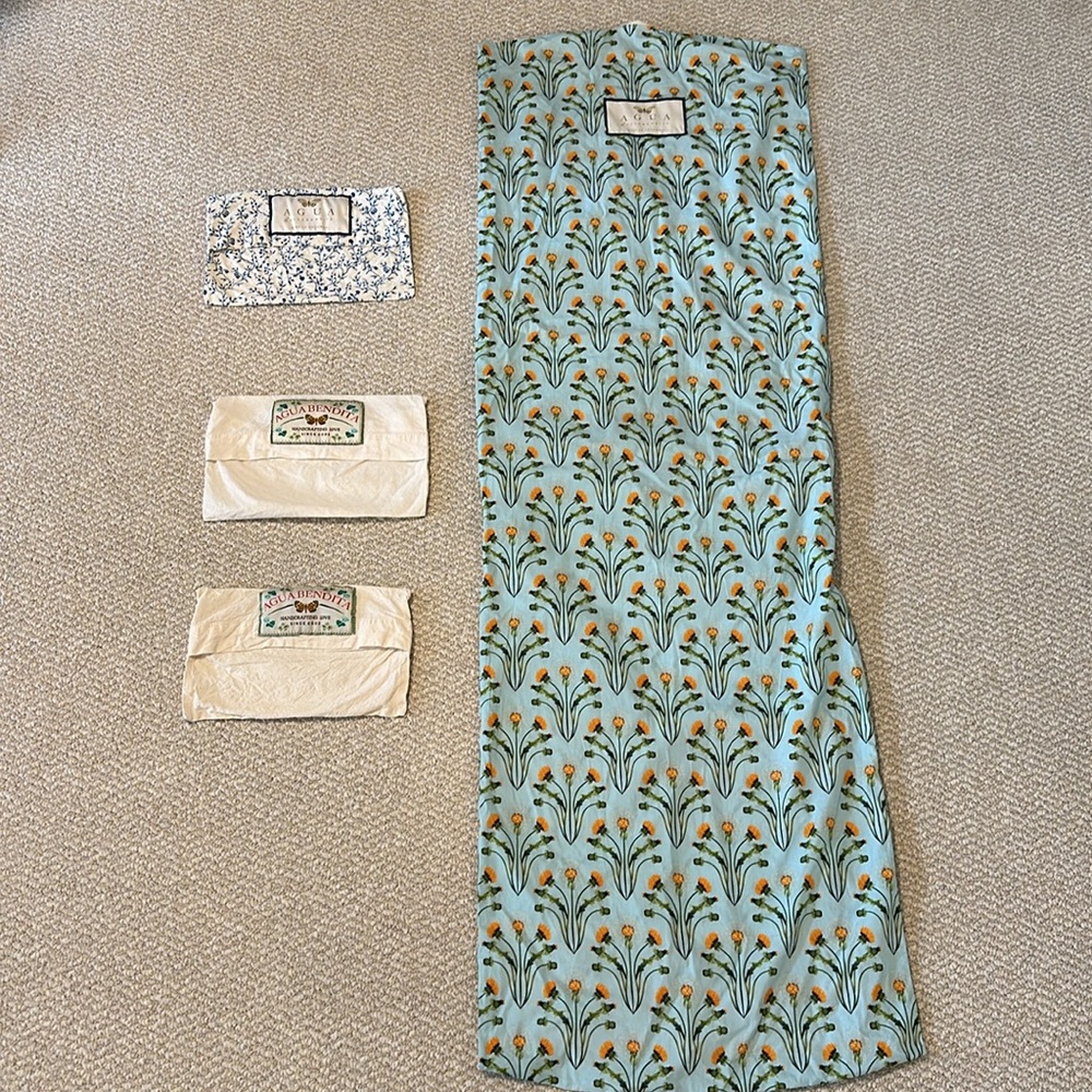 Agua by Agua Bendita | assorted garment bags